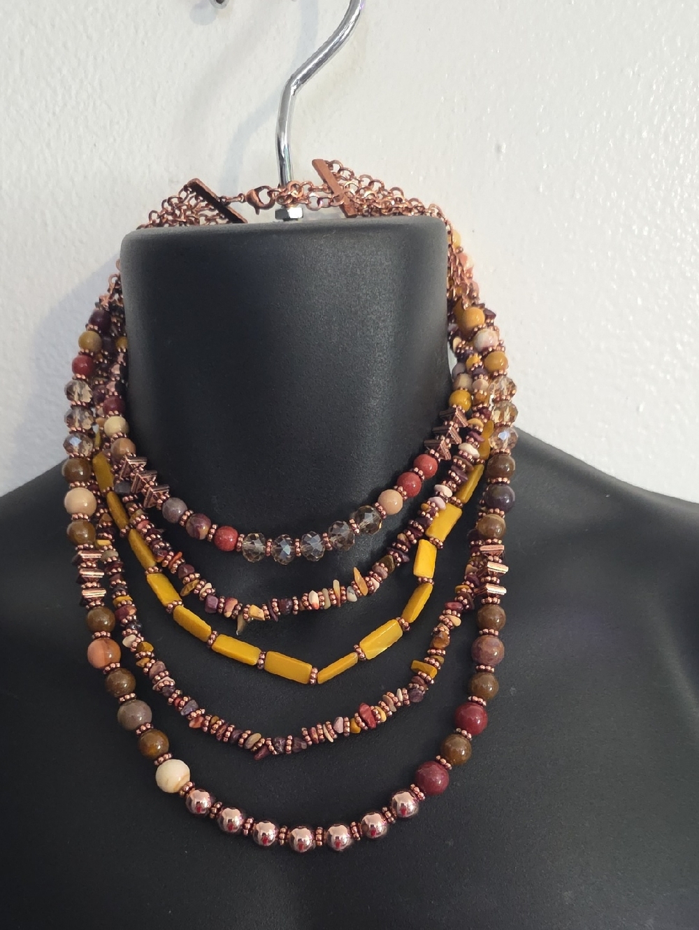 .Multi-Strand Yellow and Earth-Tone Beaded